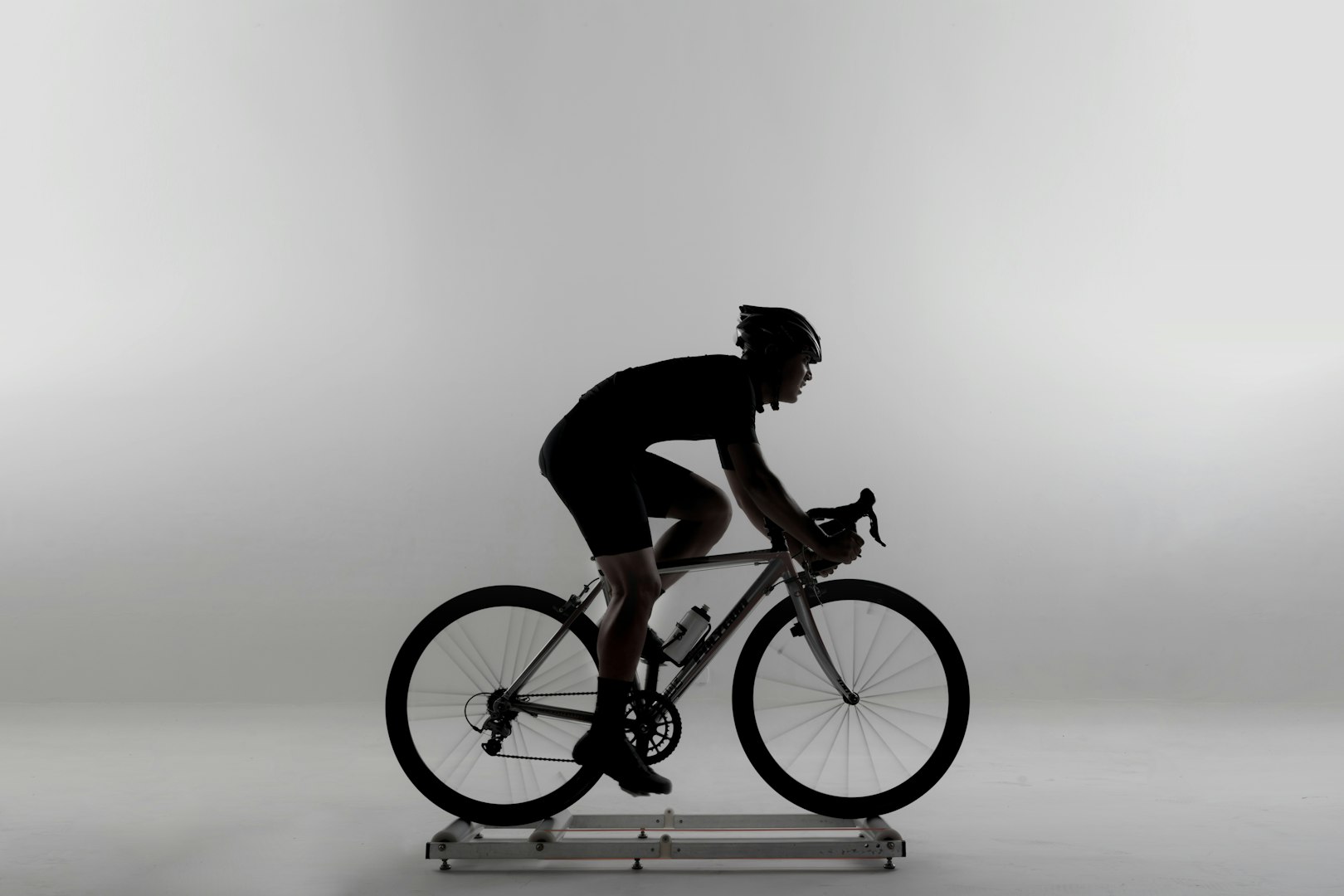 cyclist riding on rollers